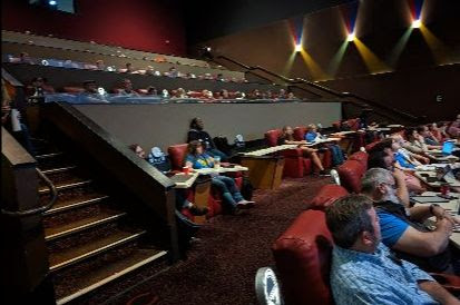 Photo of attendees in the theater seats